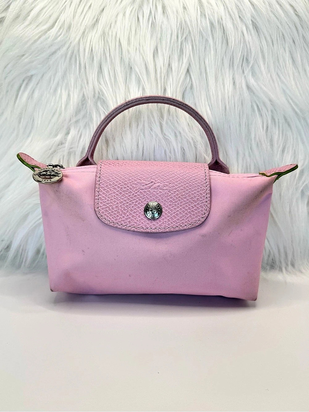 Longchamp mini Le Pliage Pouch with top carry handle